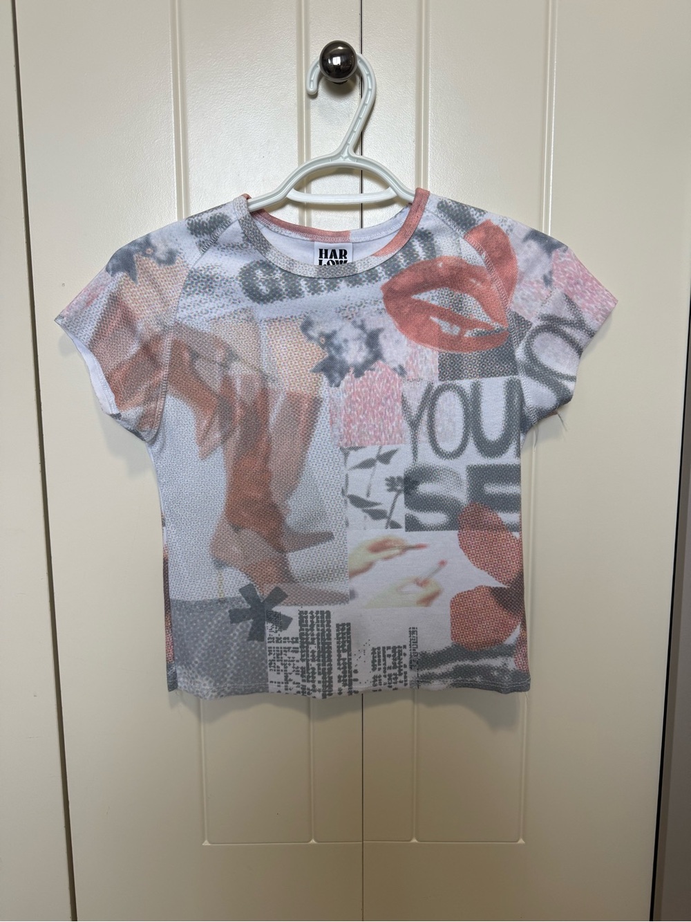 Harlow Short Sleeve Cropped Trop Featuring Newspaper Collage